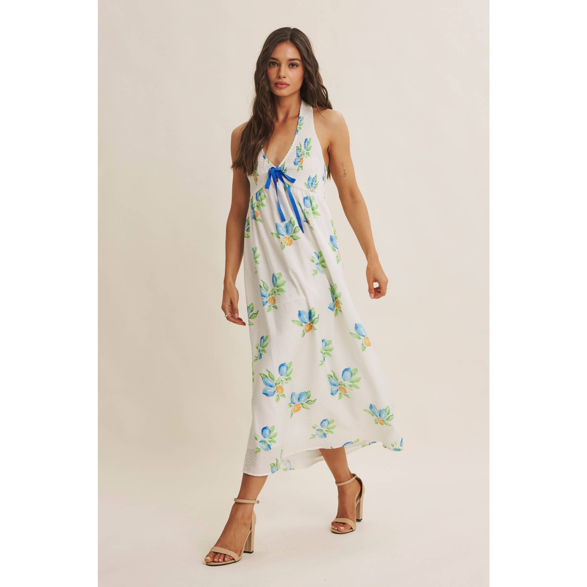 AMALFI COAST VIBE SMOCKED FLARE HALTER LEMON MIDI DRESS