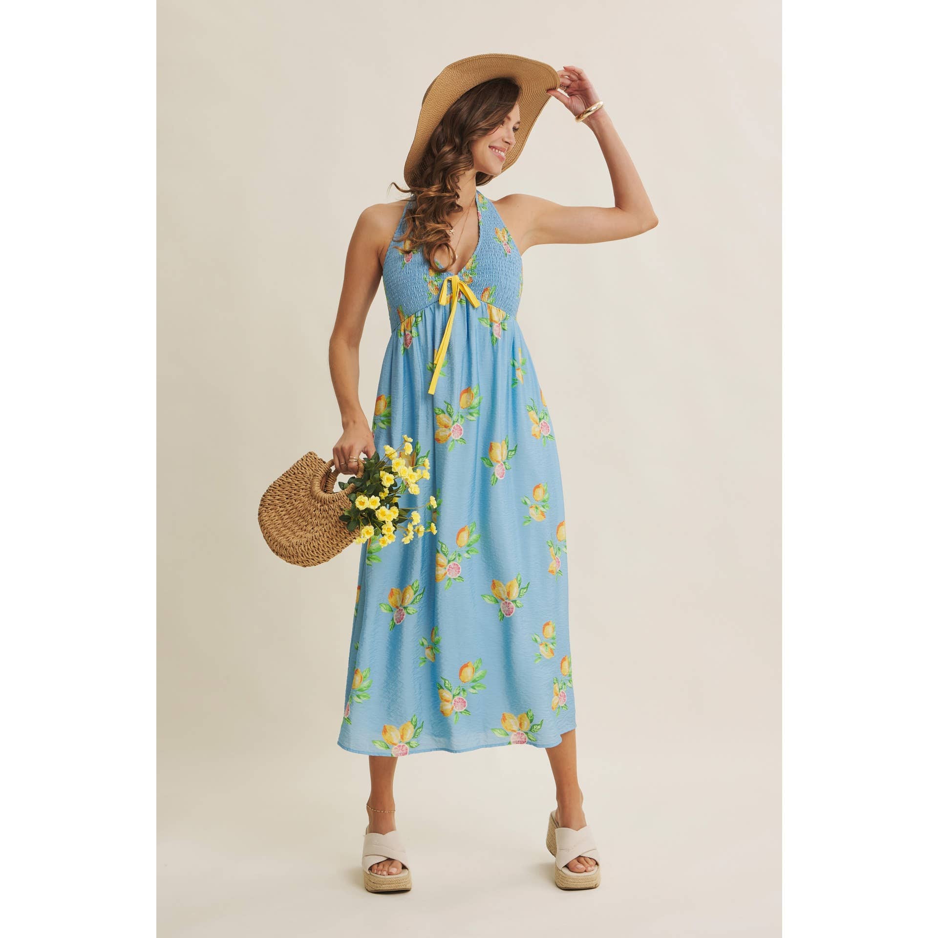 AMALFI COAST VIBE SMOCKED FLARE HALTER LEMON MIDI DRESS