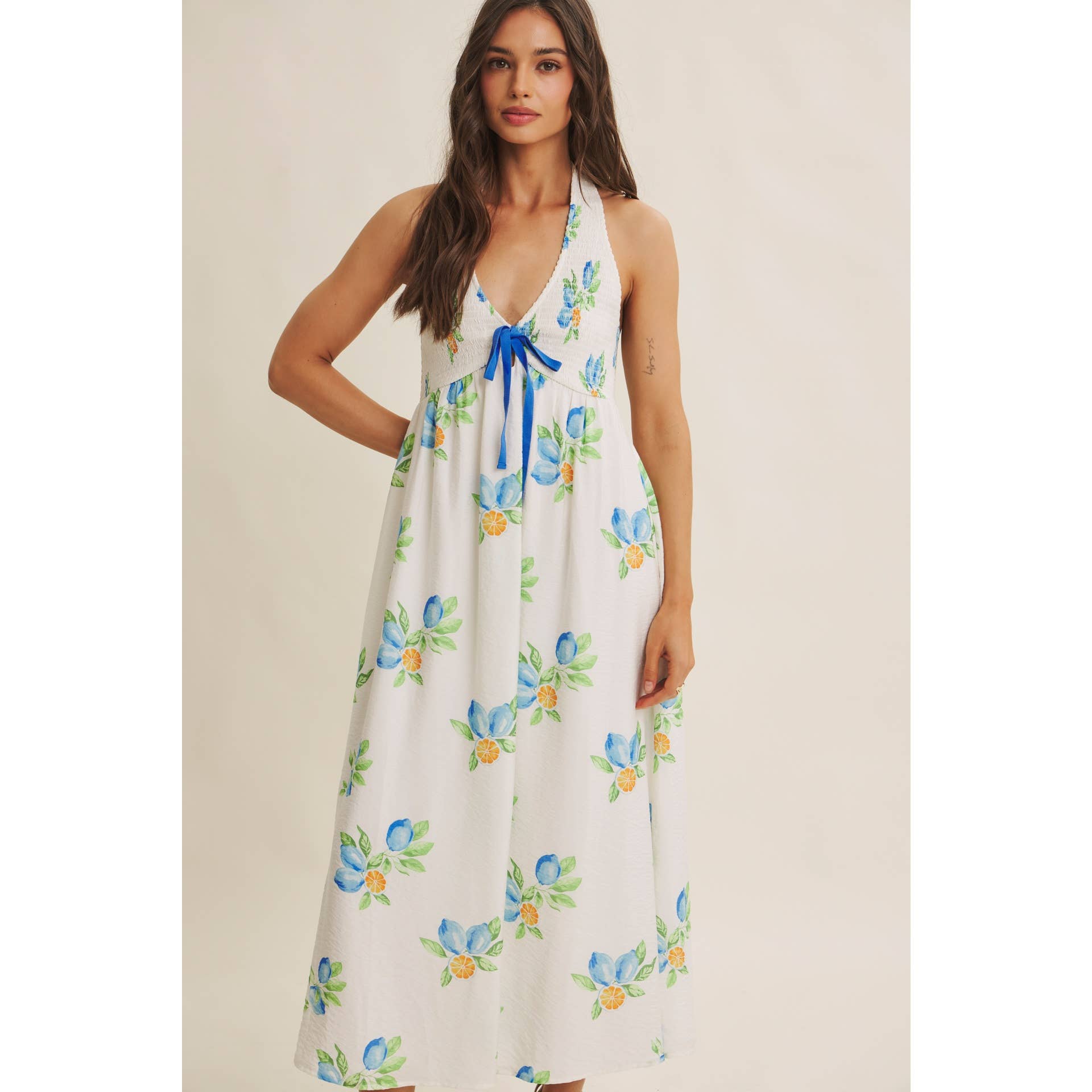 AMALFI COAST VIBE SMOCKED FLARE HALTER LEMON MIDI DRESS