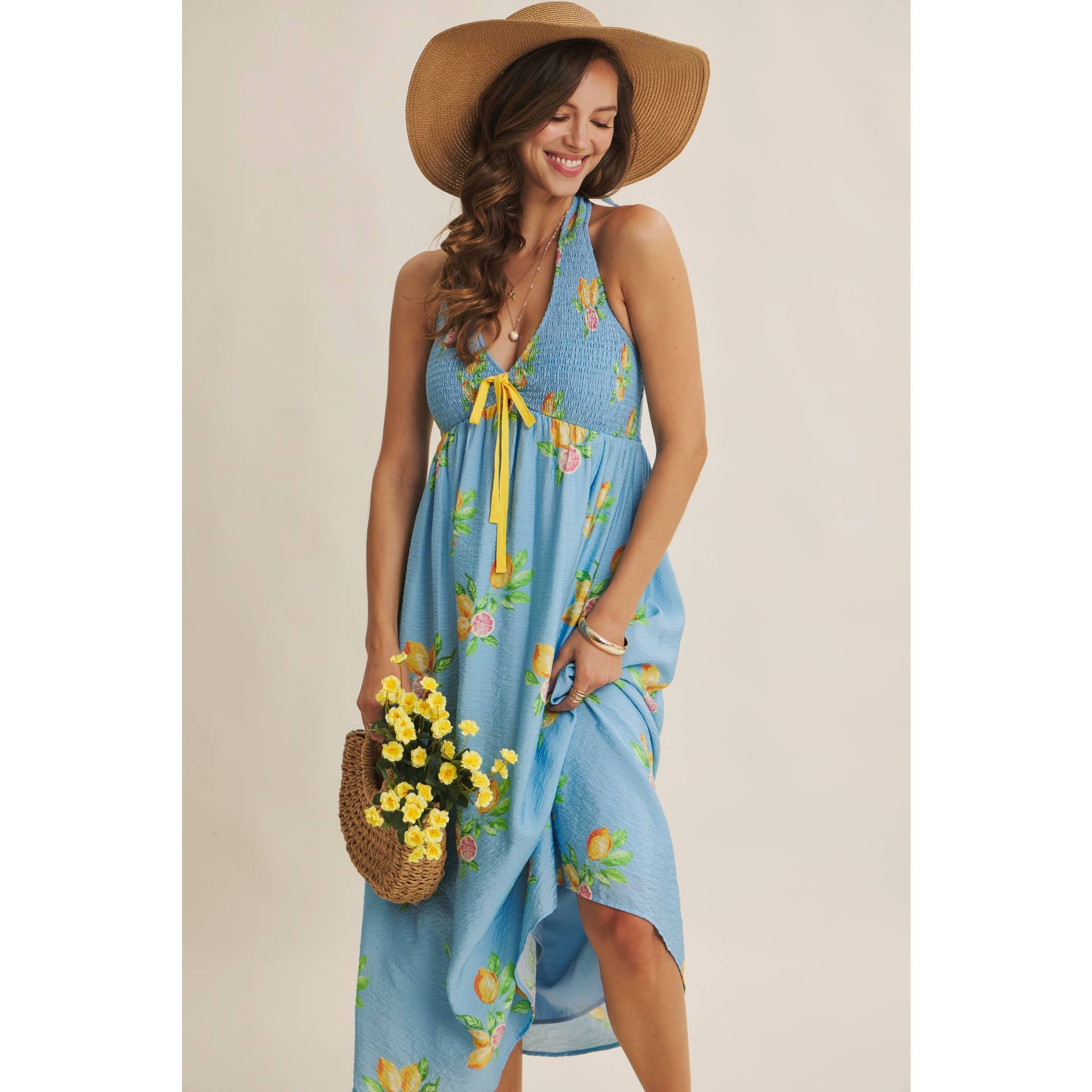 AMALFI COAST VIBE SMOCKED FLARE HALTER LEMON MIDI DRESS