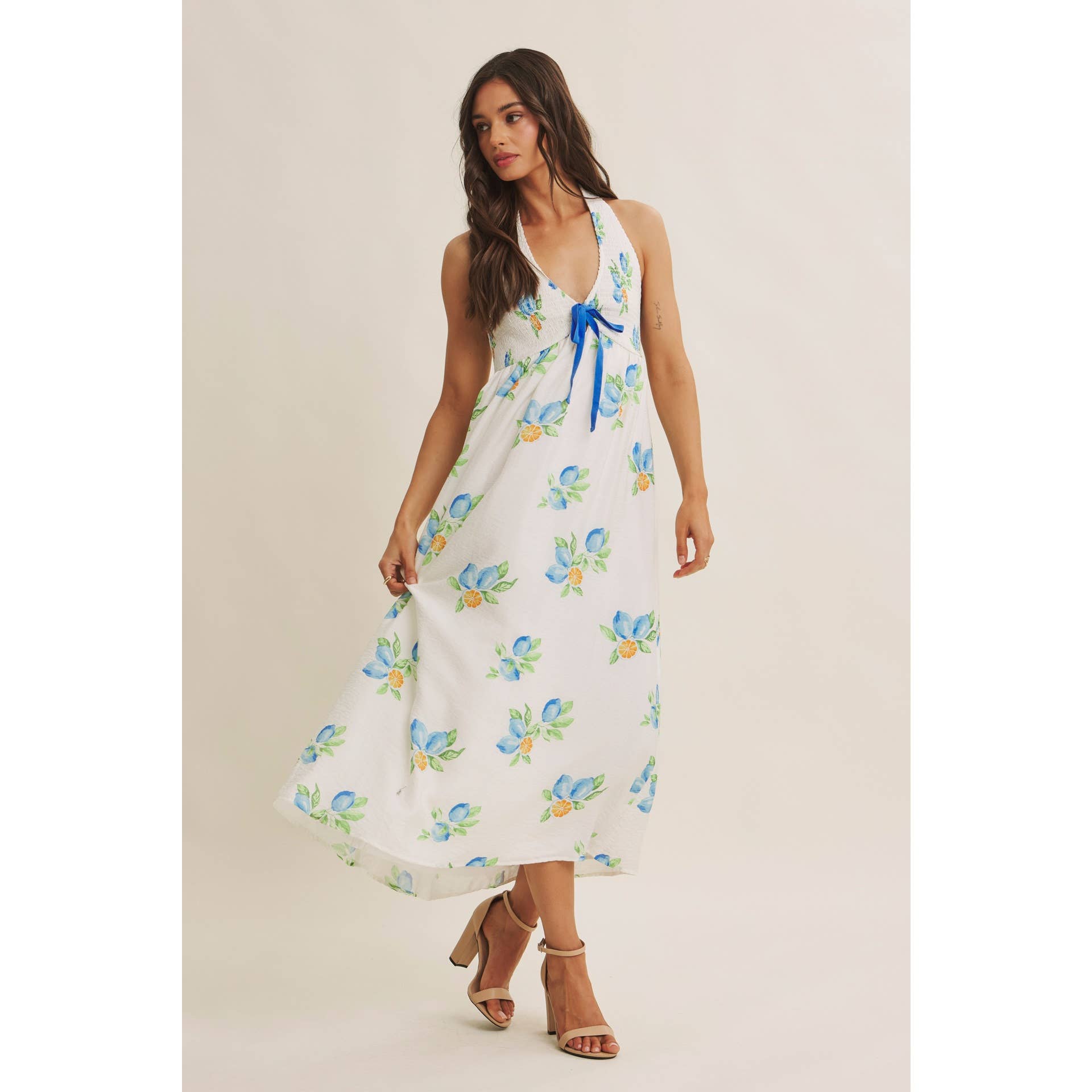 AMALFI COAST VIBE SMOCKED FLARE HALTER LEMON MIDI DRESS