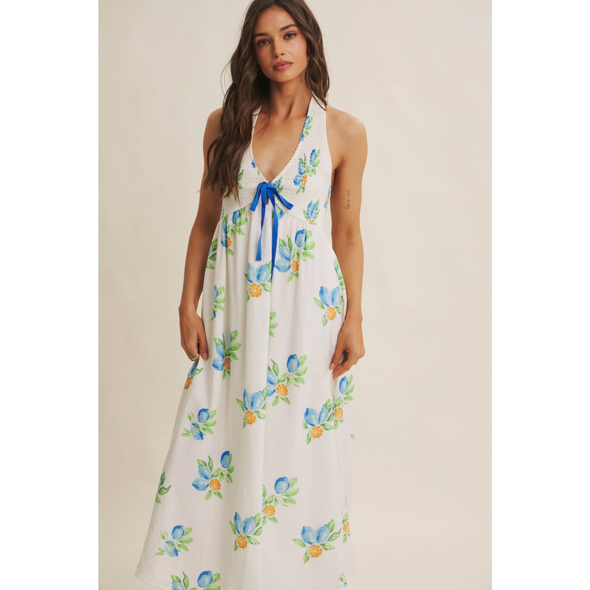 AMALFI COAST VIBE SMOCKED FLARE HALTER LEMON MIDI DRESS