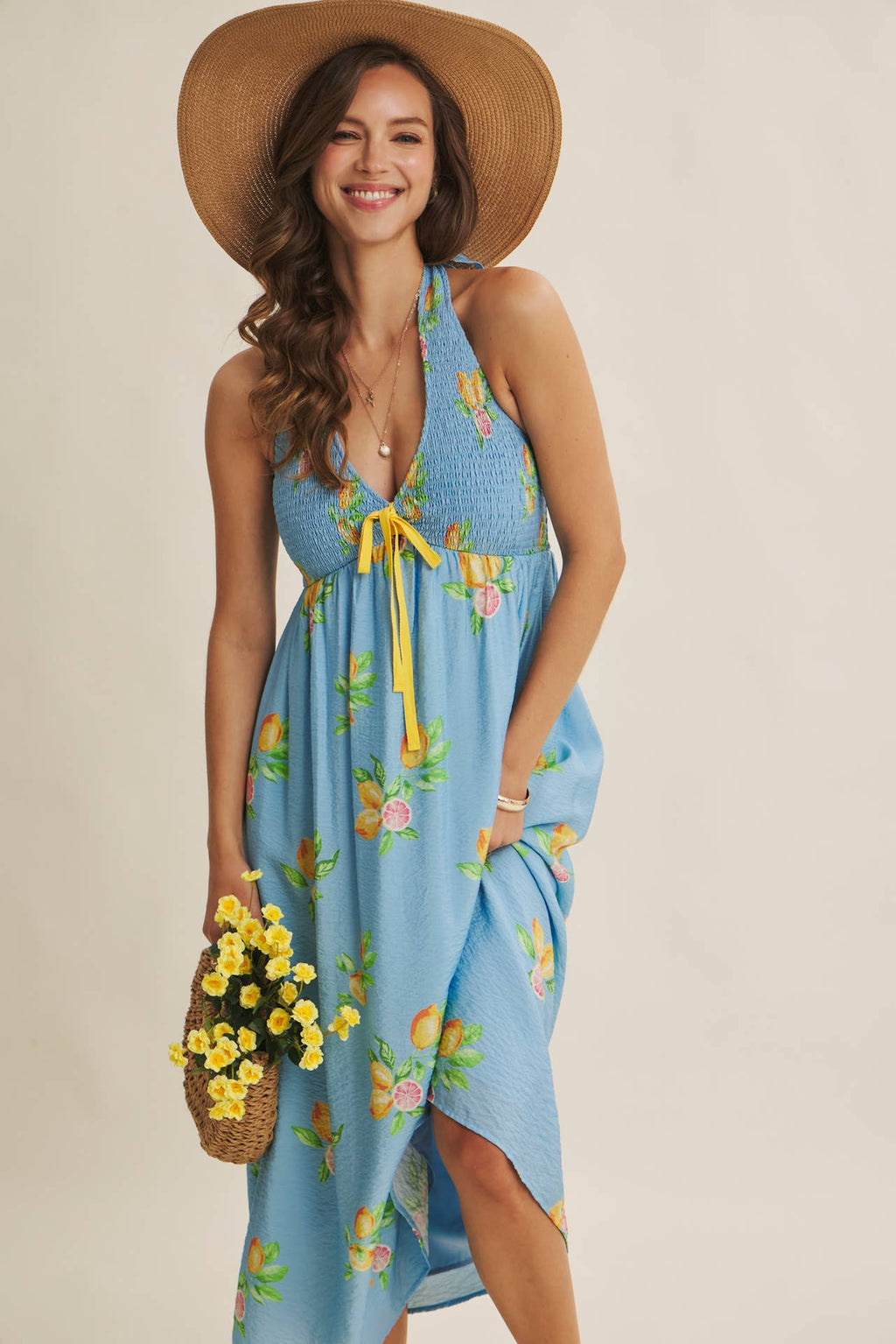 AMALFI COAST VIBE SMOCKED FLARE HALTER LEMON MIDI DRESS