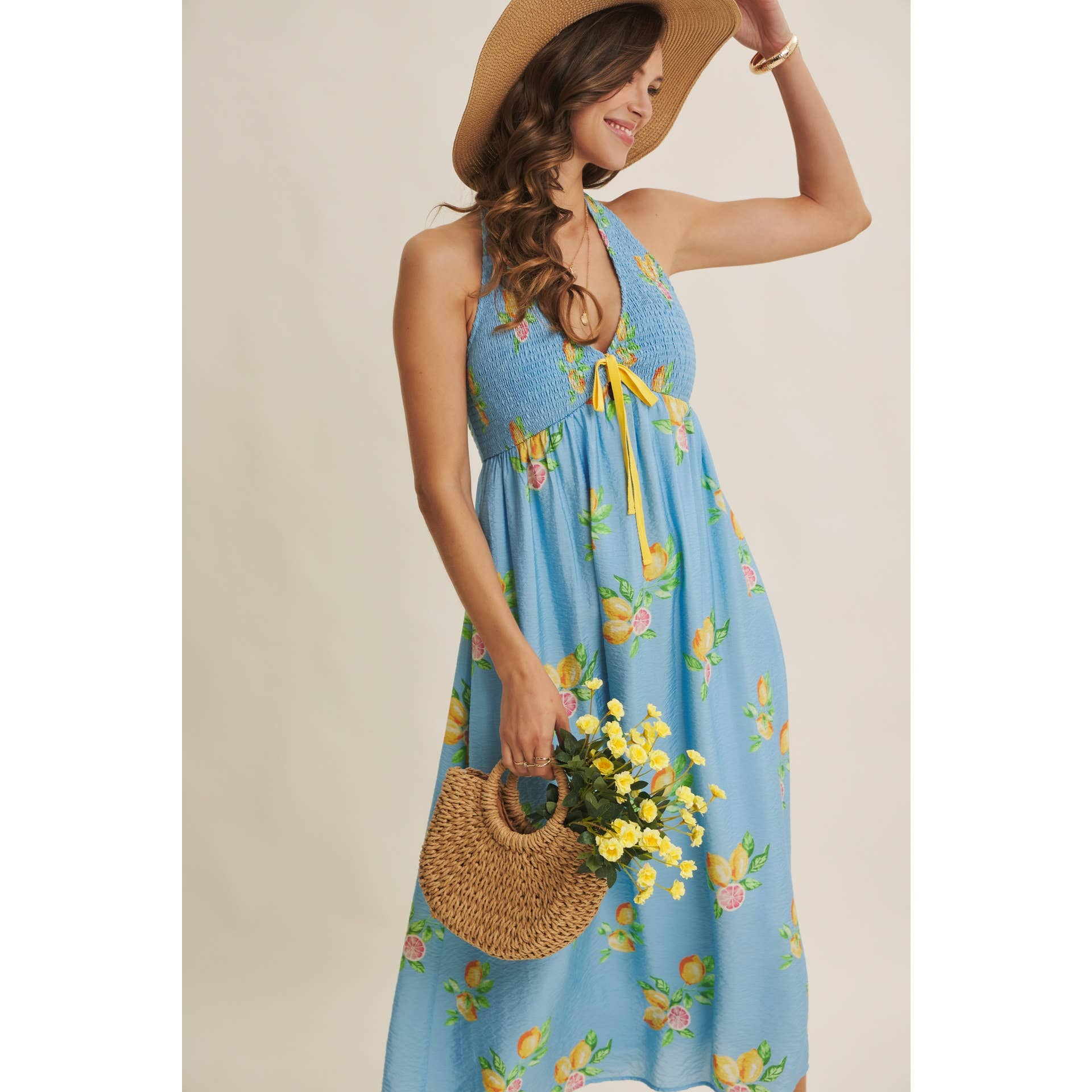 AMALFI COAST VIBE SMOCKED FLARE HALTER LEMON MIDI DRESS