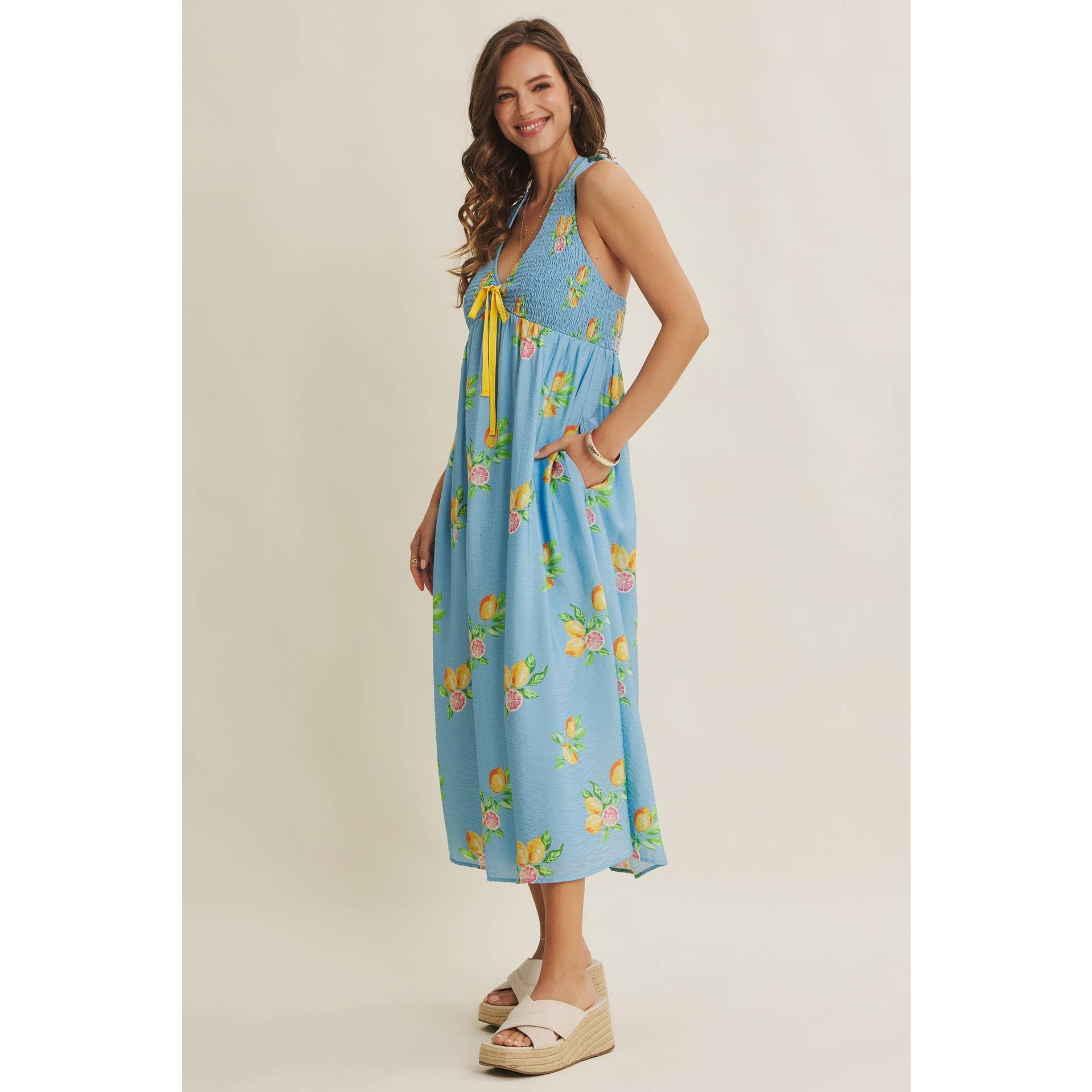 AMALFI COAST VIBE SMOCKED FLARE HALTER LEMON MIDI DRESS