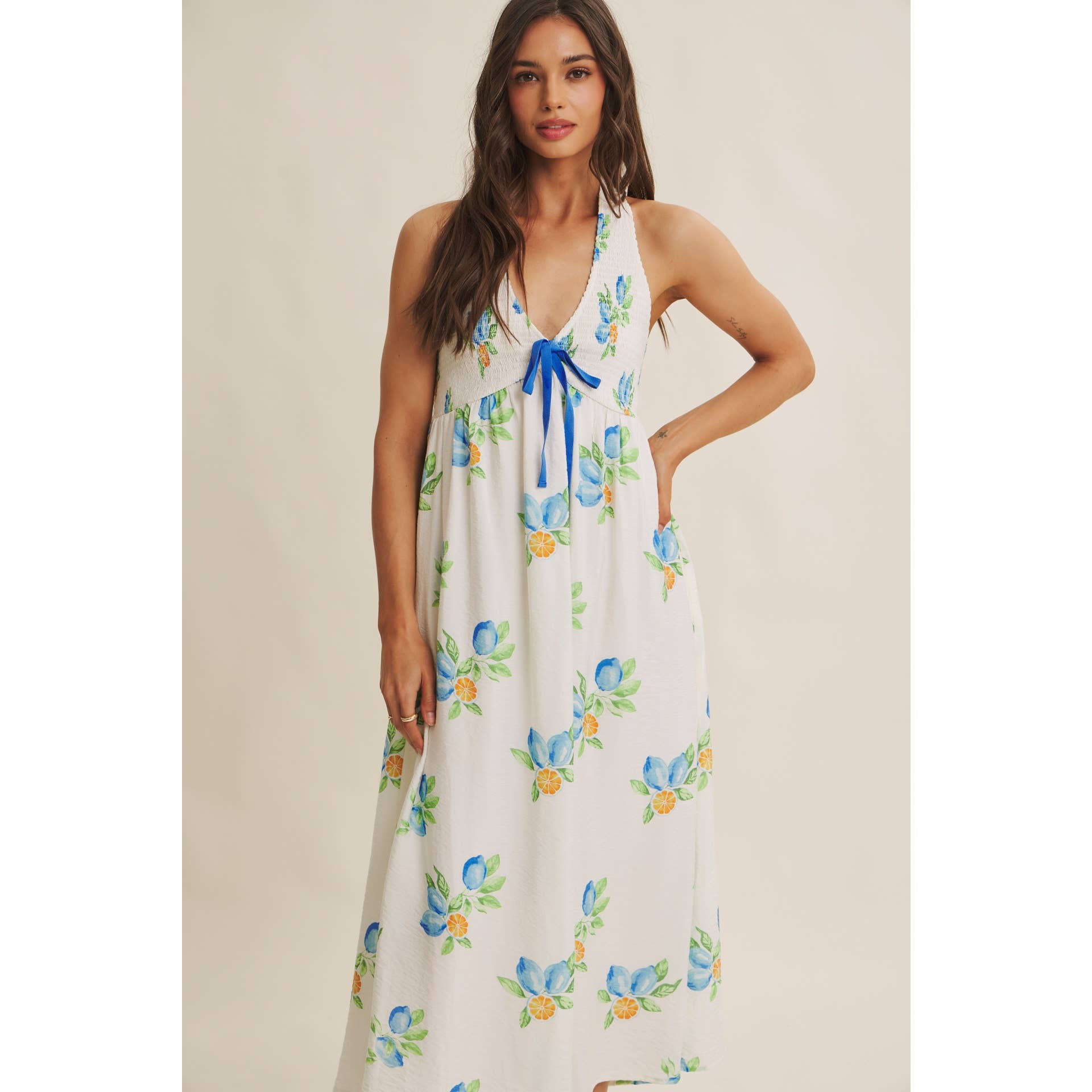 AMALFI COAST VIBE SMOCKED FLARE HALTER LEMON MIDI DRESS