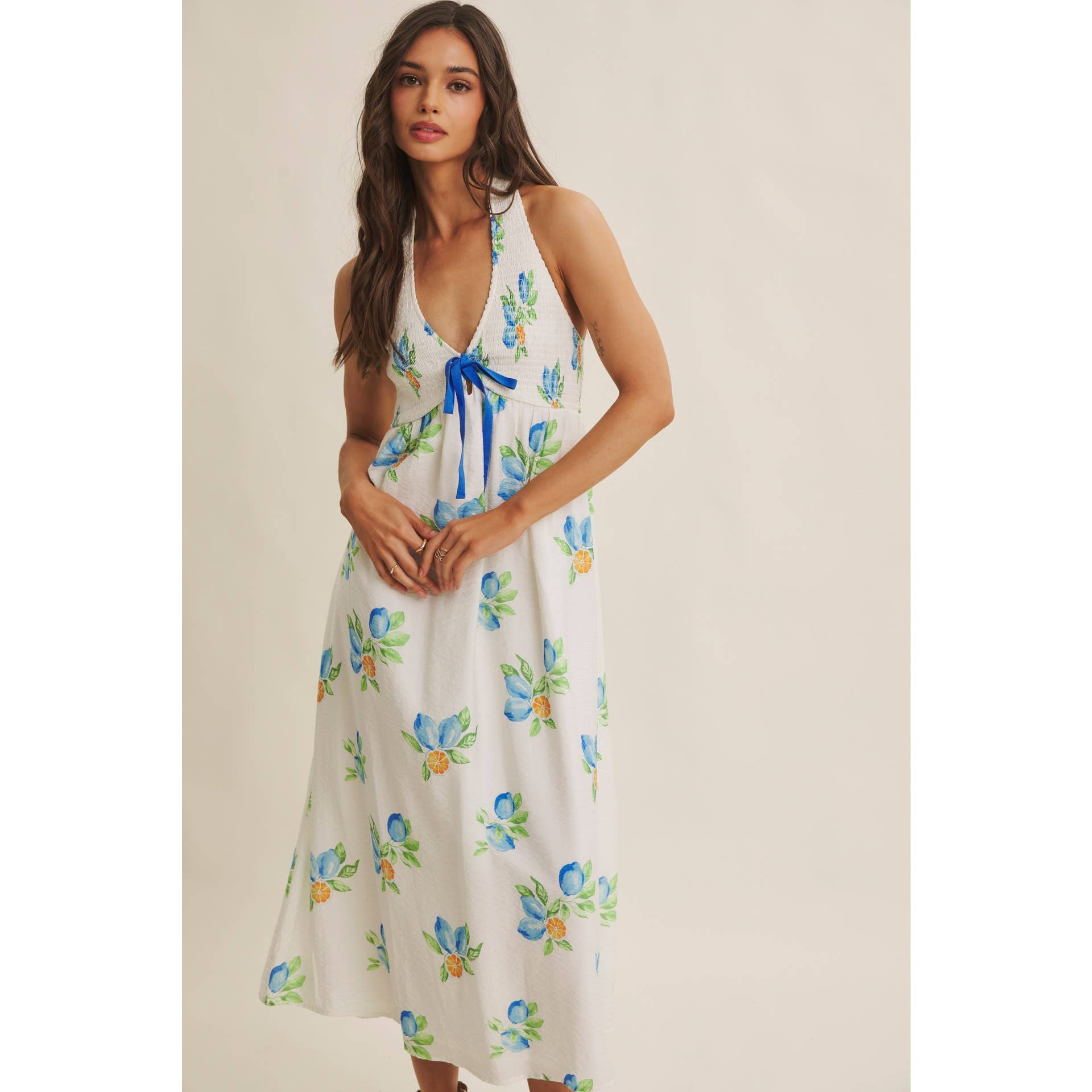 AMALFI COAST VIBE SMOCKED FLARE HALTER LEMON MIDI DRESS