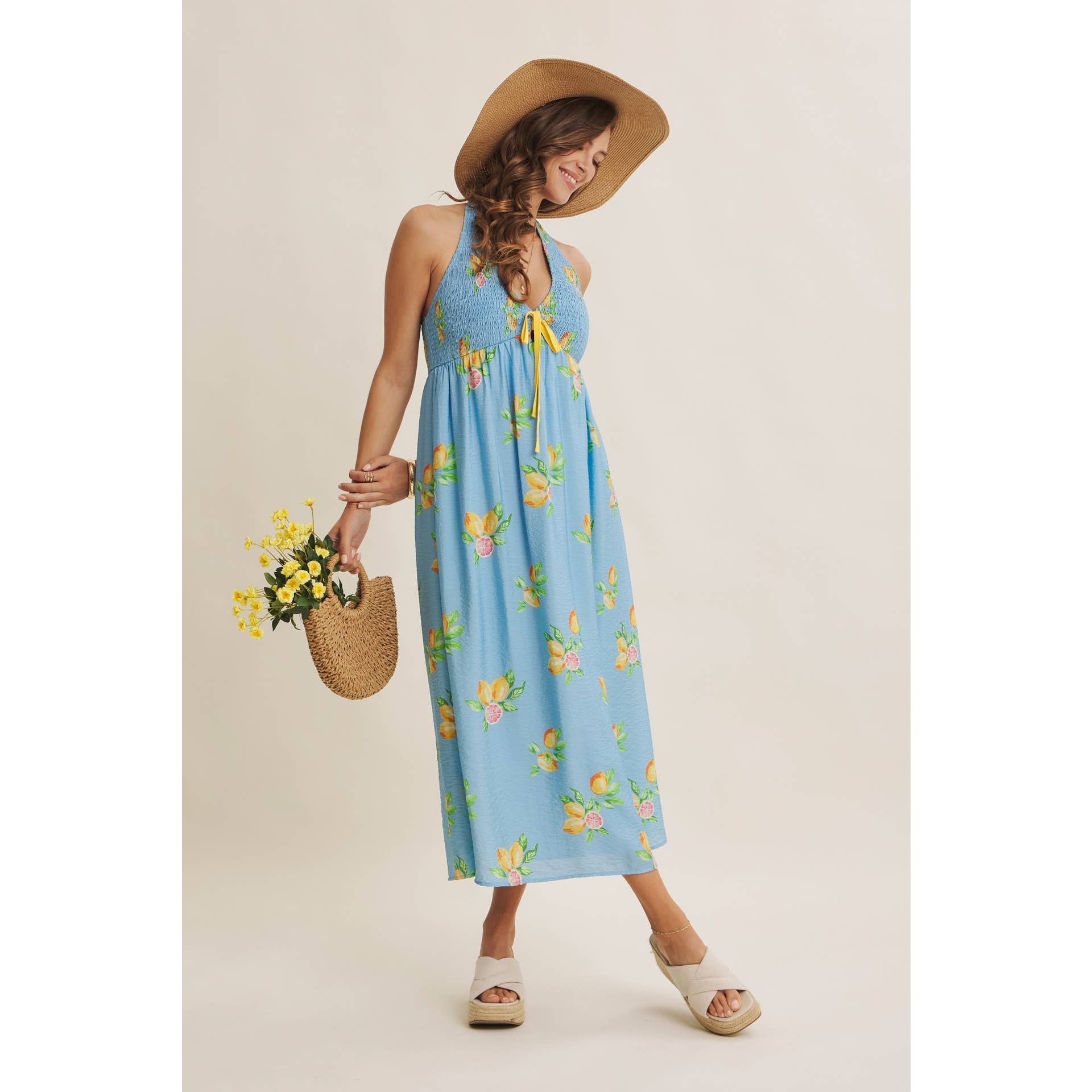 AMALFI COAST VIBE SMOCKED FLARE HALTER LEMON MIDI DRESS